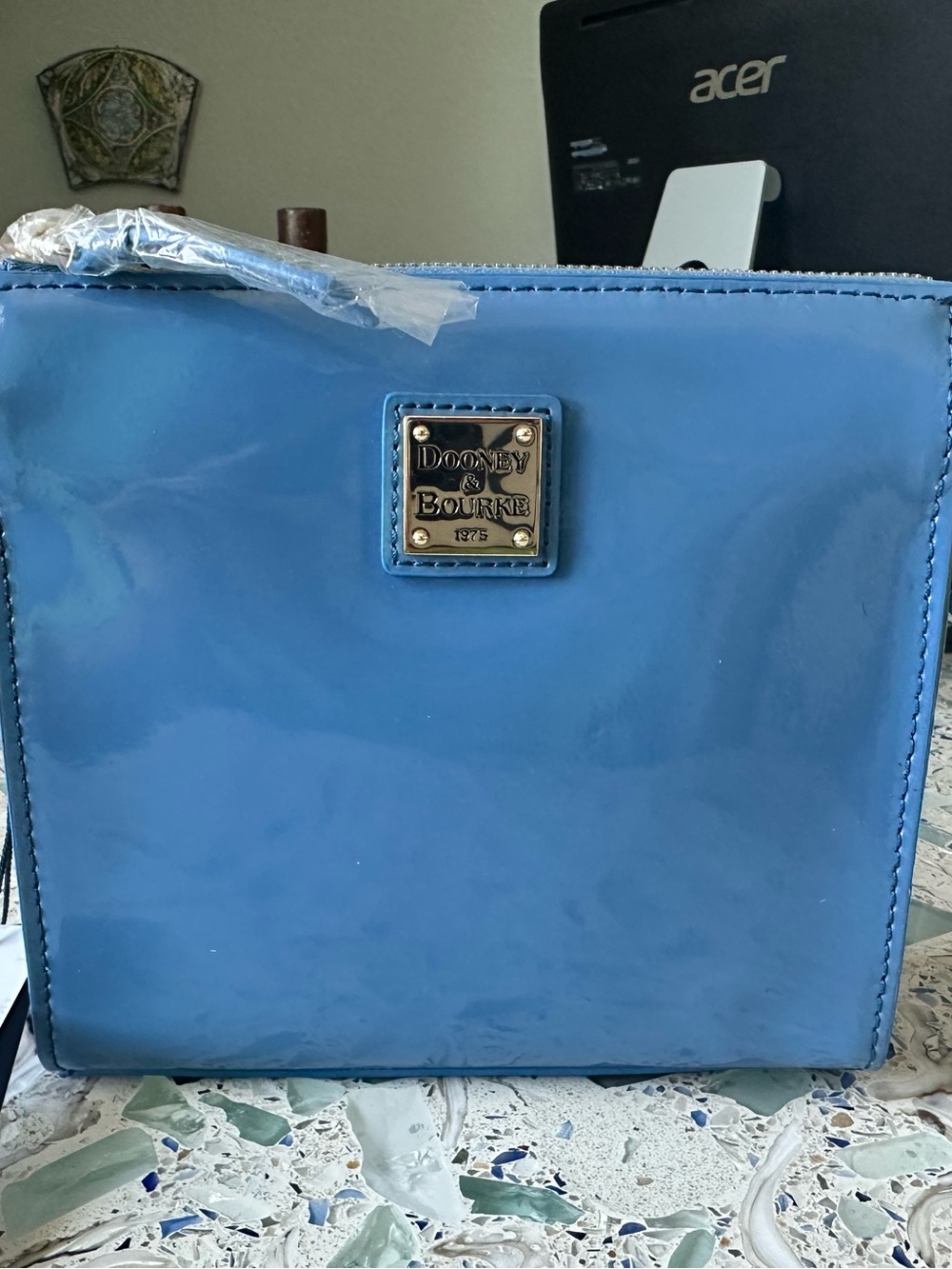 Dooney & Bourke North-South Janine Patent Crossbody Pouch in Azure Blue